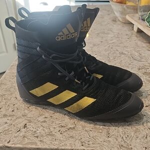 adidas Black and Gold Athletic High-Tops